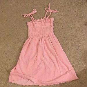 Girls’ pink terrycloth coverup